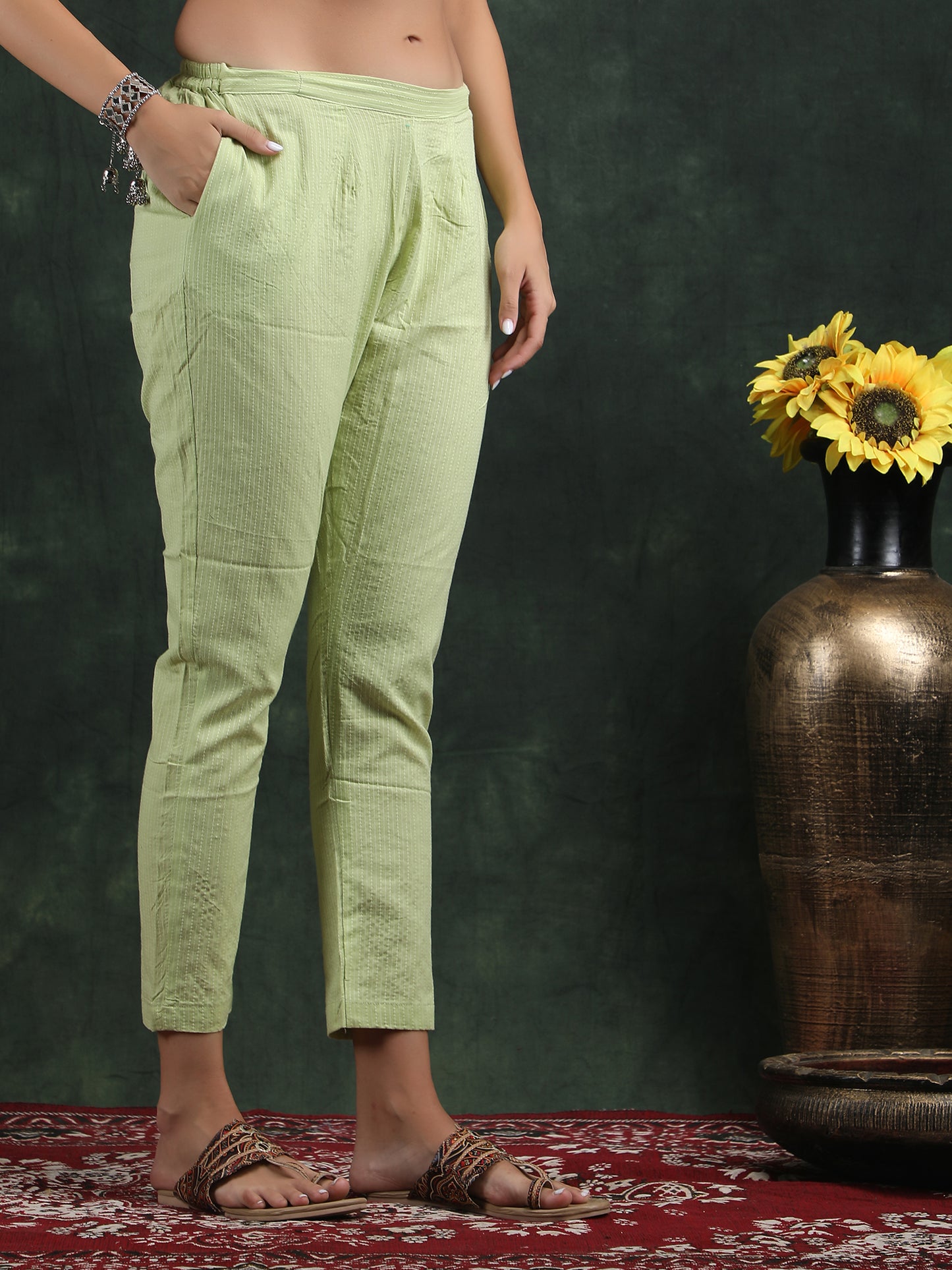 sleevless teek green kurti with pant suit set